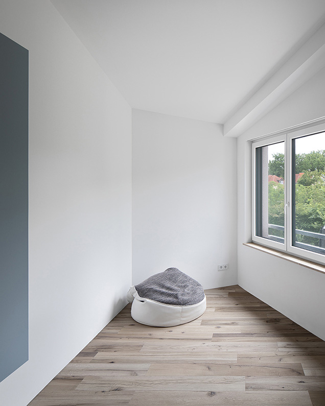 Architekturfoto von einem kleinen Gästezimmer in Berlin.
